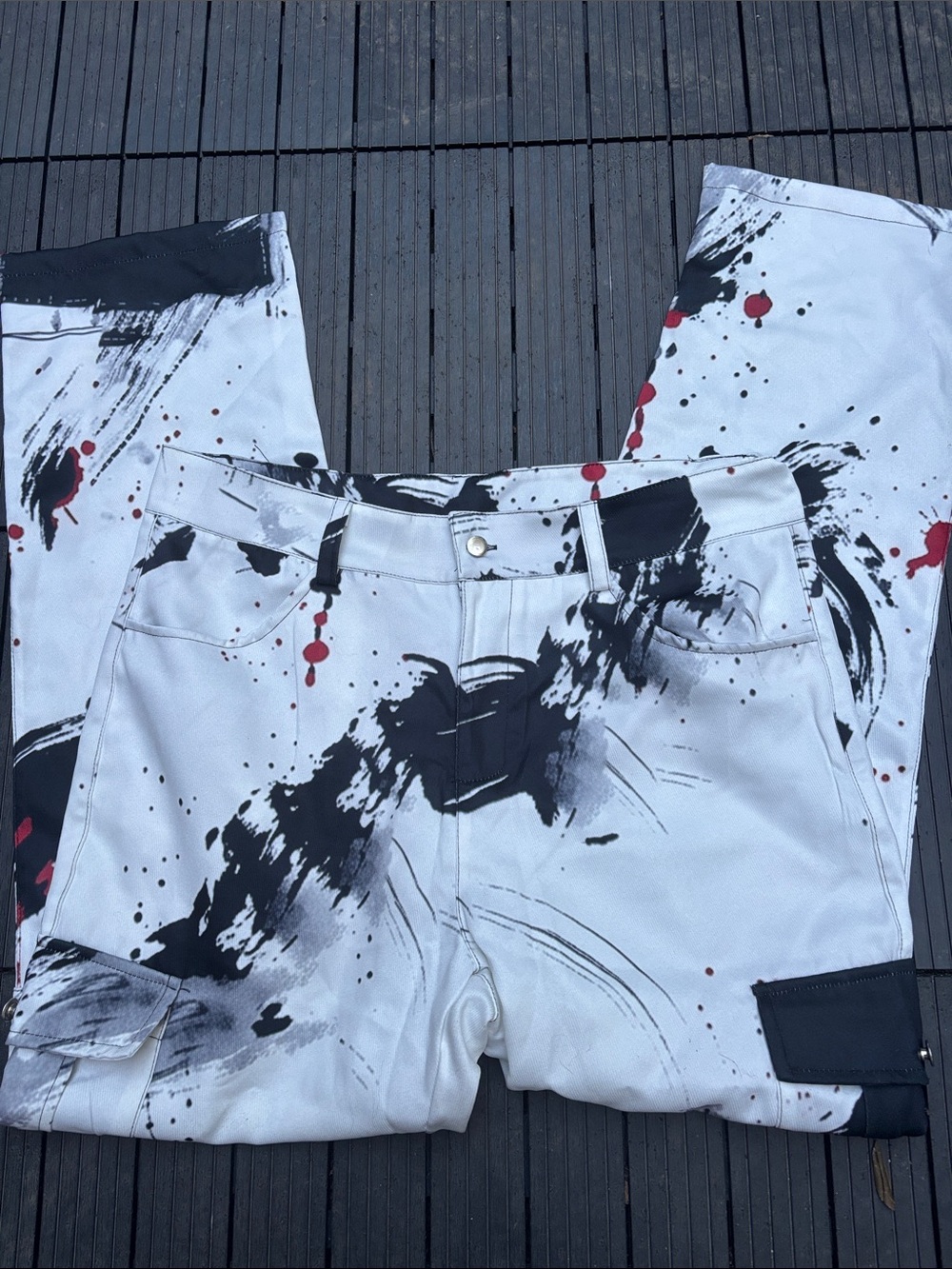 White Paint-Splash Cargo Pants with Black & Red Accents